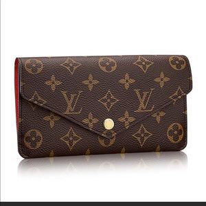 💯% Authentic Louis Vuitton Jeanne wallet.